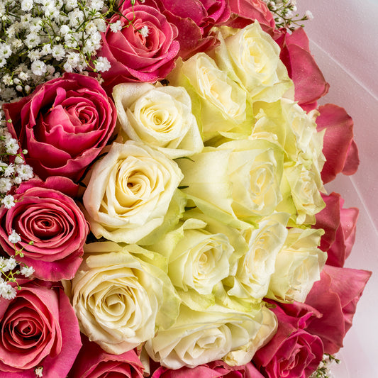 Bouquet of peach and white roses