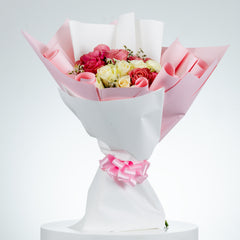 Devine Peach and White rose arrangement