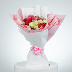 Devine Peach and White rose arrangement