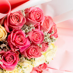 Devine Peach and White rose arrangement