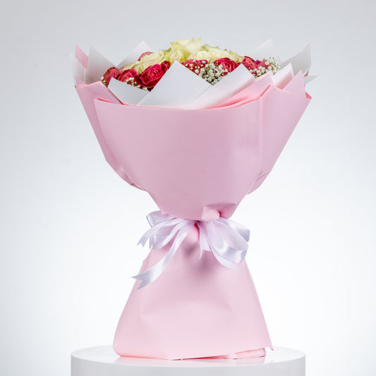 Bouquet of peach and white roses